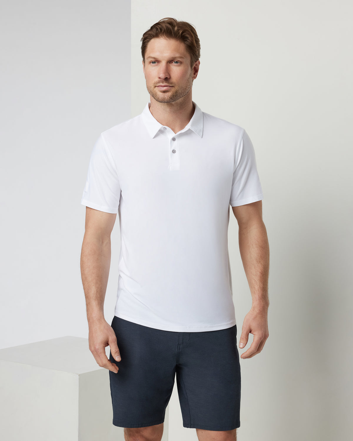 Strato Tech Polo Men's White Athletic Polo | Vuori onsale